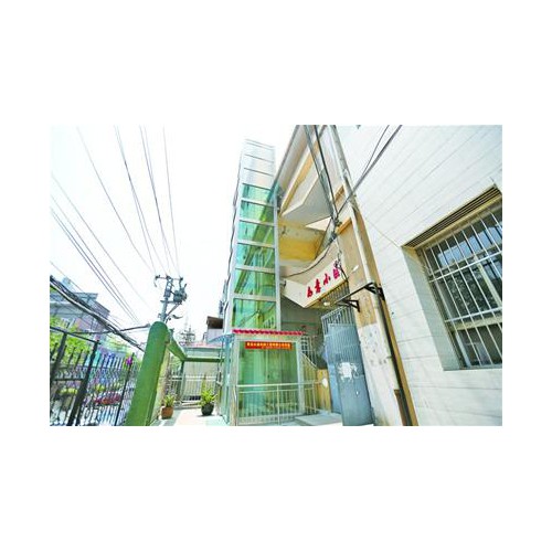 青岛首个老楼电梯加装工程正式交付 还有6个小区正筹备